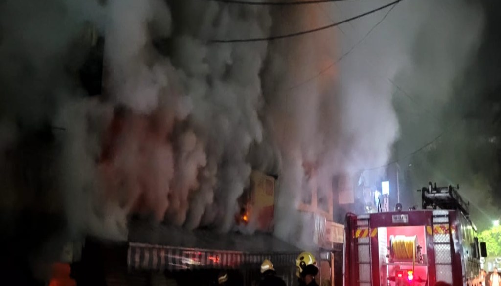 Fire Destroys General Store in Lodge Building Opposite Pune Station